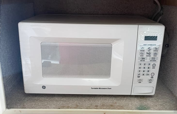 Microwave can be removed for more storage if not camping with full hookups.