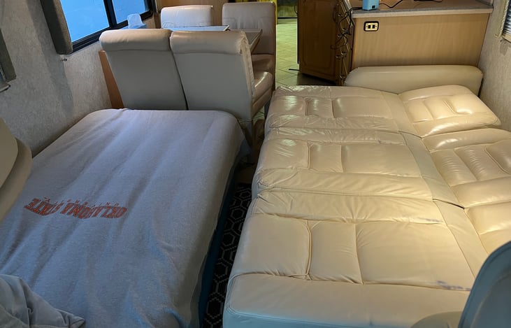 Optional configuration with twin size airbed at front of coach.