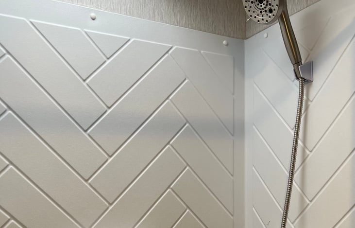 We believe one of the best parts of our trailer - the upgraded shower head! We replaced the original shower with an upgraded 10-setting shower head. Enjoy a little closer comfort to home!