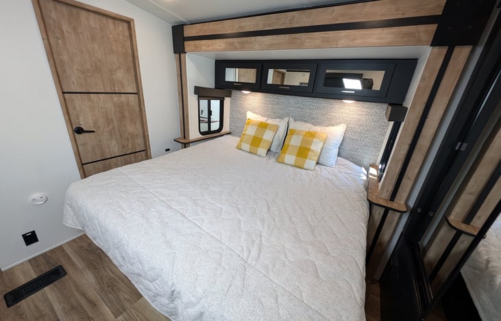 Beautiful master suite with king size bed and orthopedic mattress topper