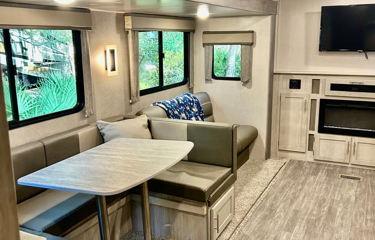 Dinette lays down for more sleeping space.