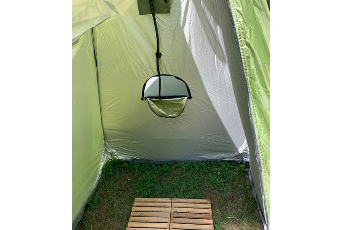 Folding shower grate