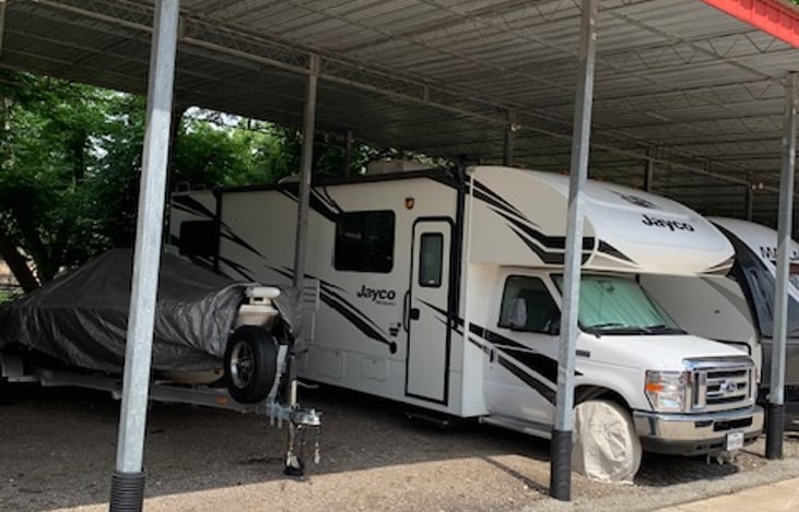 Kept in storage when not in use. Covers placed on a/c unit, tires, and mirrors to protect from the weather.