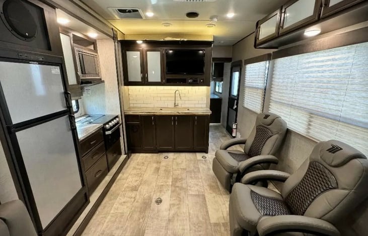 Plenty of interior space for your and your family comfort. Comfy recliners to rest in or to watch a movie. All the amenities of home