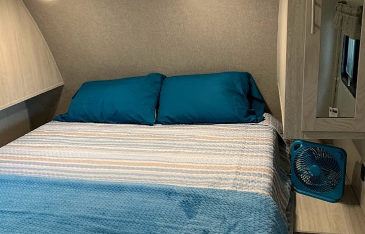 Bedroom with queen size bed.