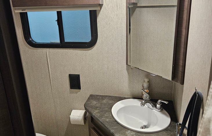 1/2 bath off of kitchen/living area