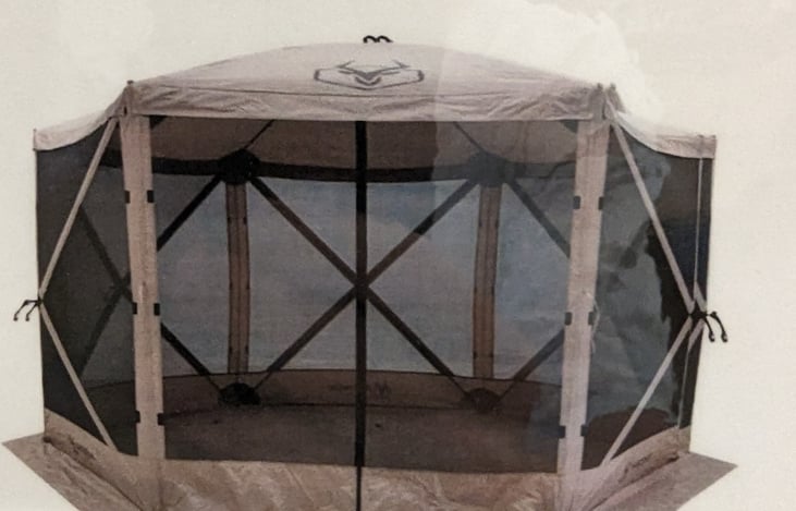 Optional; Large easy-up 10X10 gazebo.  Great for your picnic table, kids play area.  Dry and bug free.  $15/day or $75/trip, which ever is less.