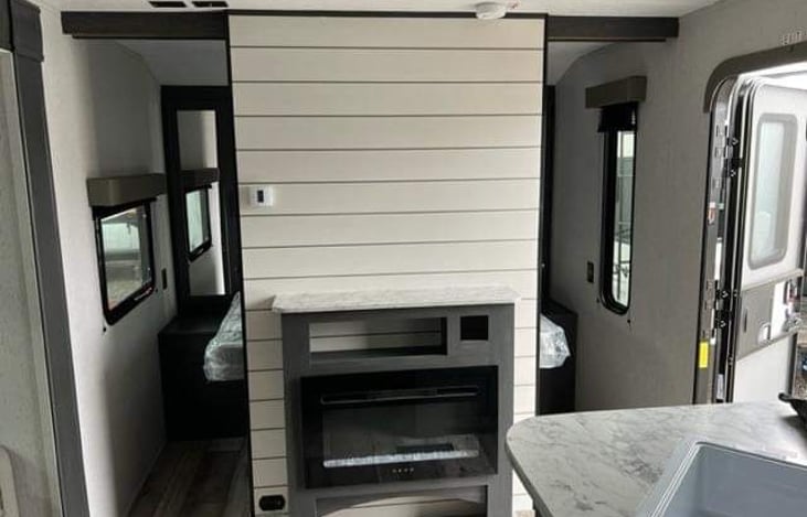 Electric fireplace that glows multiple colors!  Very warm!