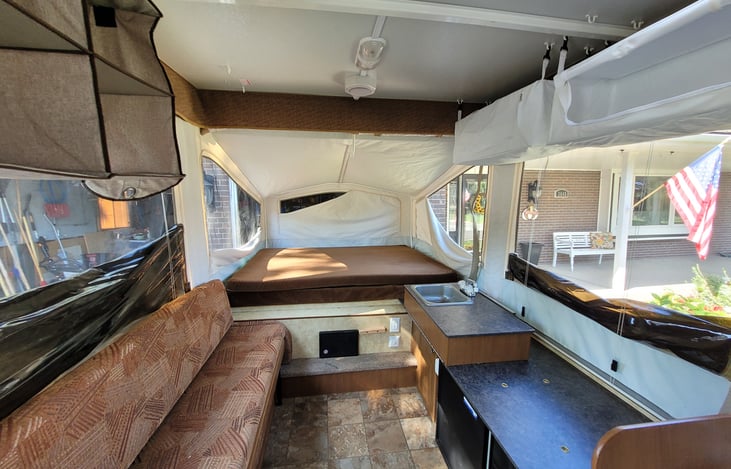 Bench on left that pulls out to make XL twin