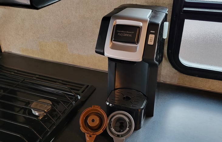 COFFEE MAKER PODS OR GRINDS. COFFEE NOT INCLUDED.