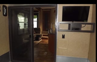 Luxurious Toy-hauler with 3 slides and 14' garage.