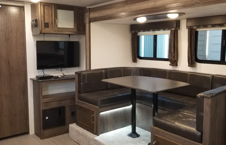 Dinette - makes into a bed. Storage under benches.