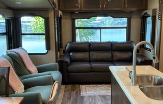 Spacious, stocked, delivered. King w/ pullout sofa