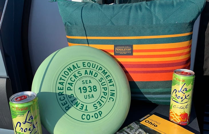 Outdoor blanket and frisbee