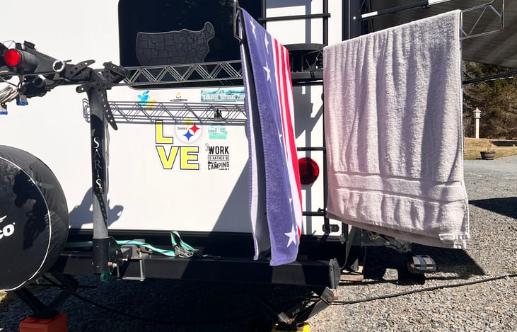 Bicycle rack for up to 3 bicycles. Multi arm clothes and towel hanger for those messy, but oh so fun, beach and pool trips.