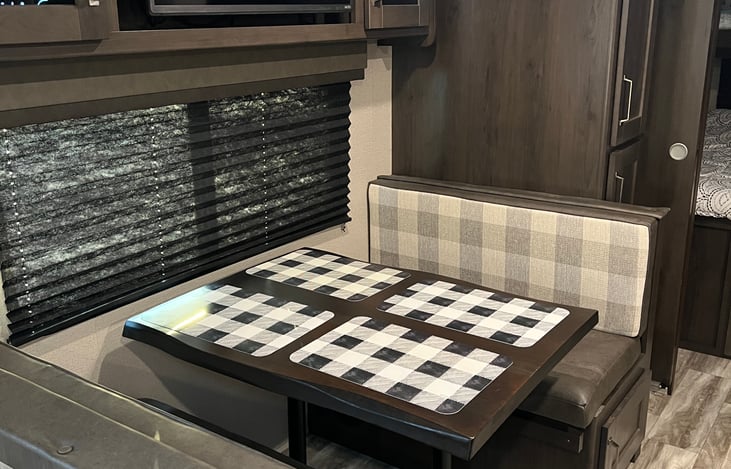 Dining Area - TV is above the table.