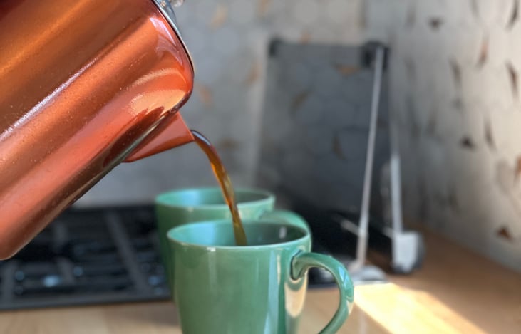 Percolator coffee makes 8 cups over the stove