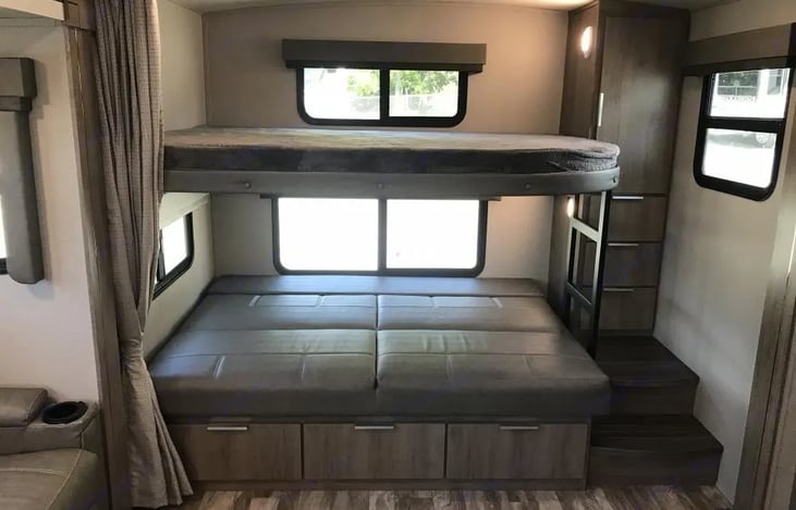 lower bunk in bed position