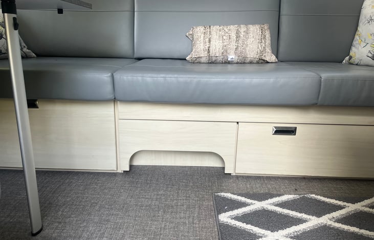 Sorage under sofa. Sofa pulls down into a bed