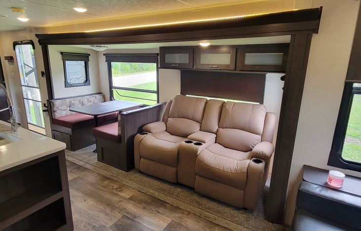 Relax while watching your favorite NetFlix shows!  Kitchen table is also a bed!