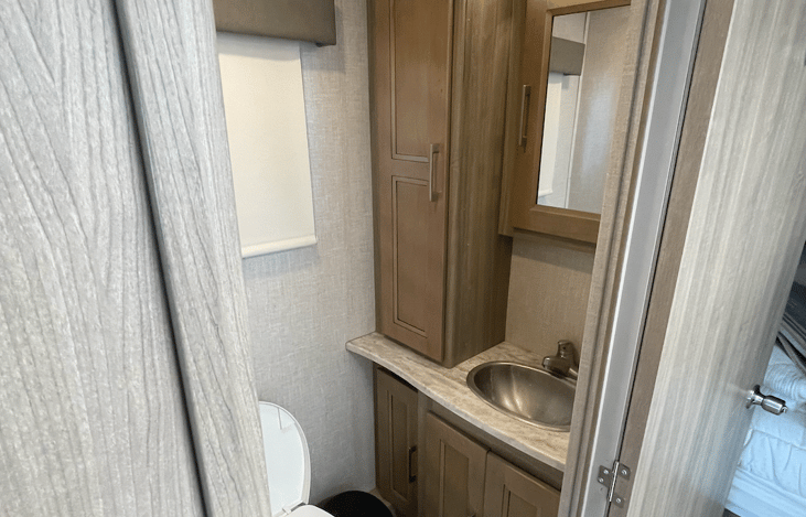 Great bathroom with sink and toilet.