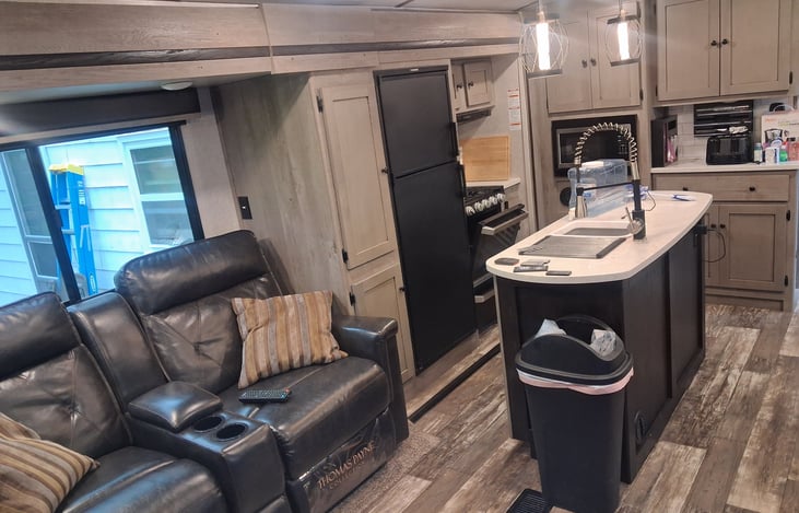Enjoy watching tv from the upgraded leather recliners!