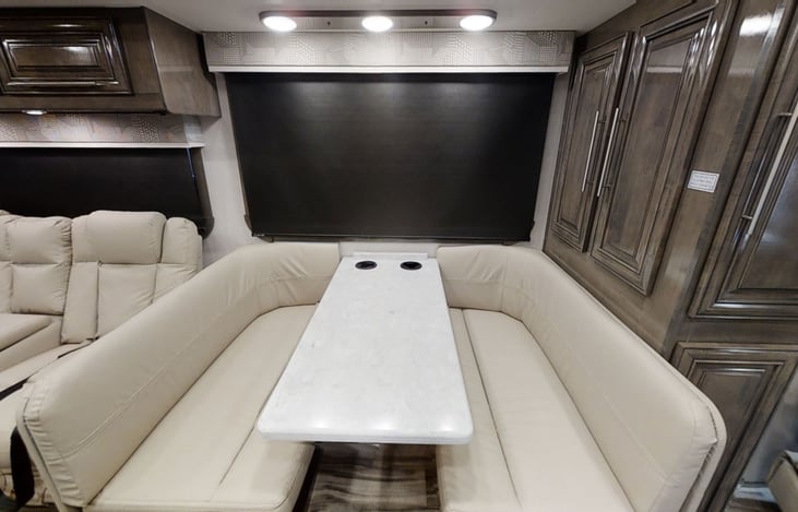 Kitchen table folds down into another sleeping space