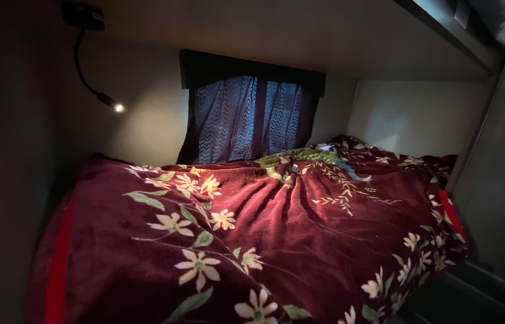 Bunkhouse: lower left bunk with touch button light and USB port