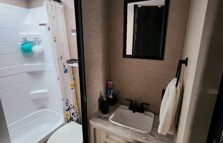 Bathroom with dedicated sink.