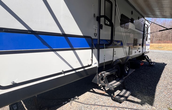 20ft x 8ft awning to sit under when it's rainy or to escape from the sun. Also shades and fully covers the outdoor kitchen so that the outdoor fun doesn't have to stop when the rain starts.