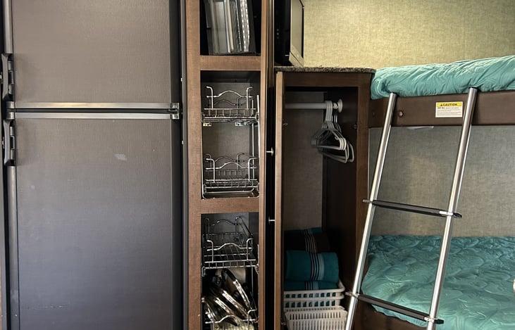 Plenty of storage. TV in top bunk