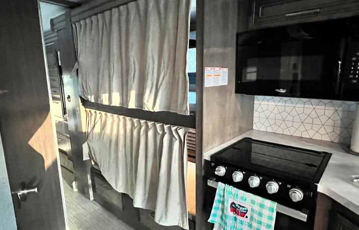 Bunk area is in their own little alcove and they even close off with curtains.  Each bunk has a tablet holder to watch TV in bed.