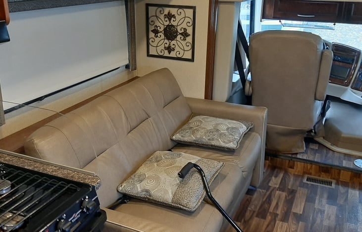 Sofa pulls out to a sleeper sofa for two.