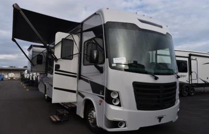 passenger front with awning out