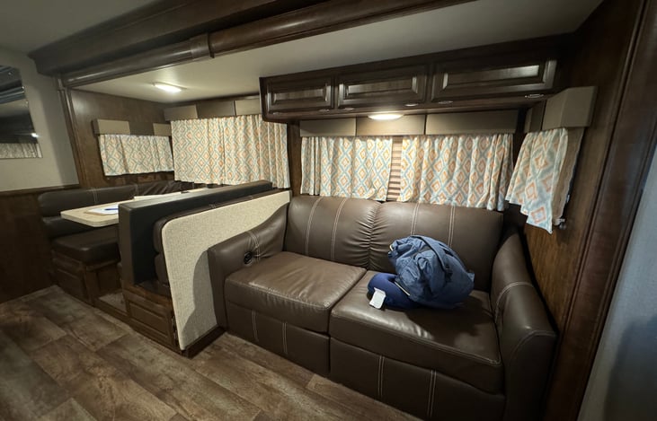 Pull out and reclining couch. 2 seatbelts in couch.