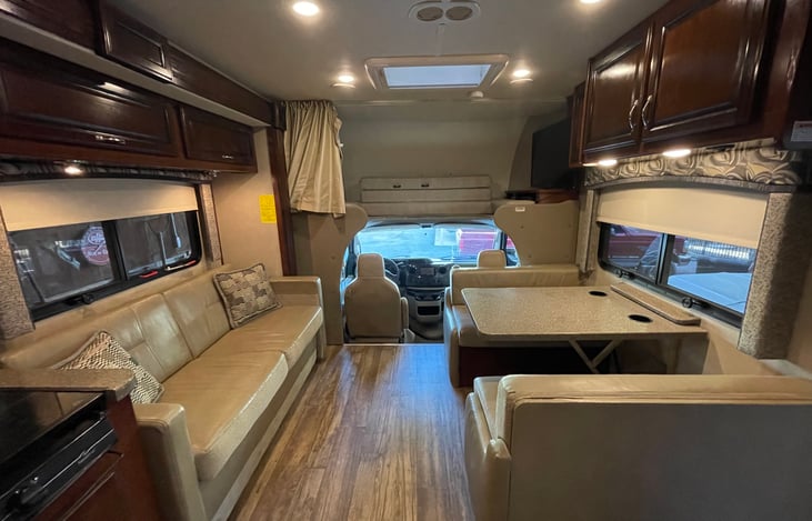 Couch and dining table  convert to allow for extra sleep space