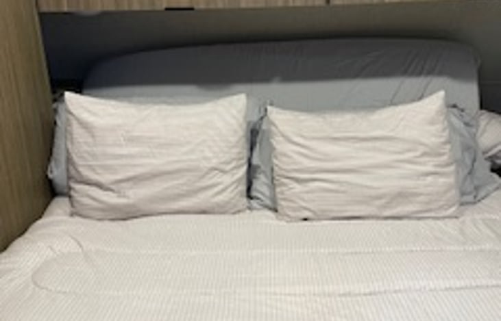 King size bed with linens