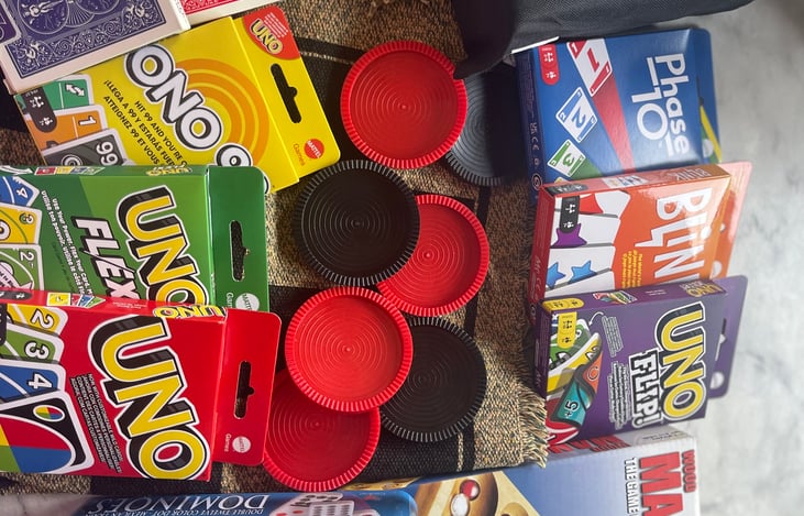 Family Games including lawn dice, Giant Checkers, and multiple card games.