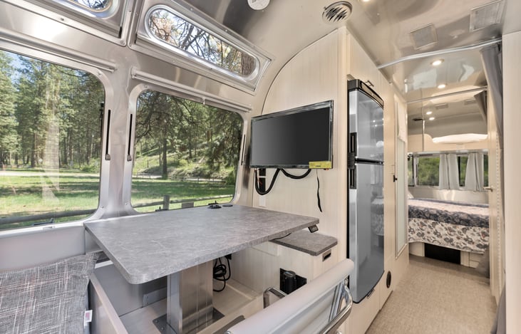 The desk moves up or down so you can stand while working.  Unlimited Wi-fi at the resort!