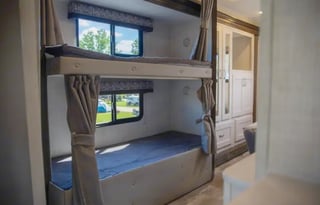 C06 - 10 Person w/ Bunk- The RV Rental Factory
