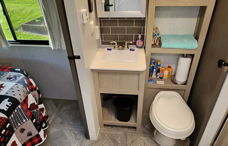Plenty of leg room and space to move in this bathroom.  No more squeezing into a corner bathroom.