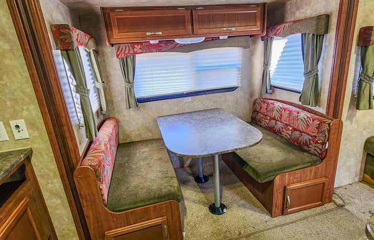 Dinette conversion with under and above storage.