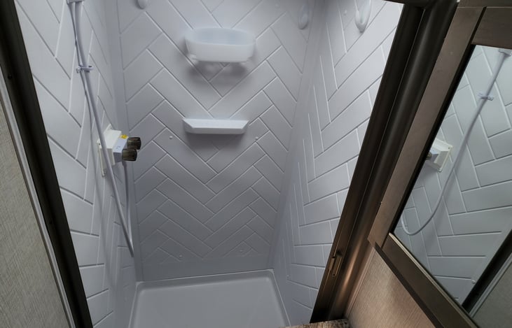 Shower with adjustable shower head.