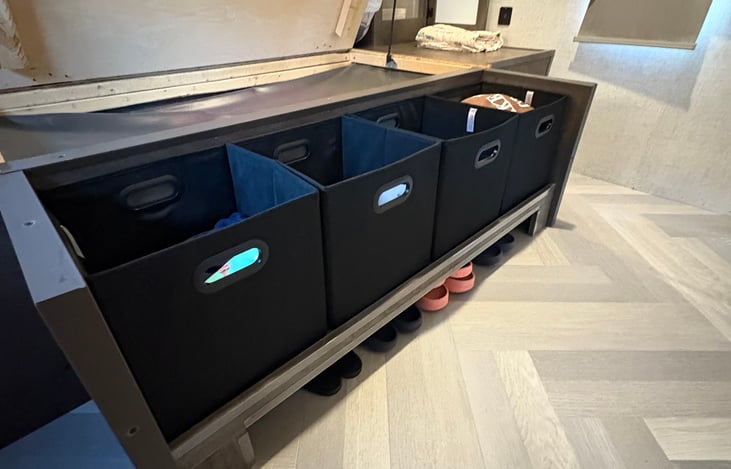 Master bedroom under bed clothes storage containers