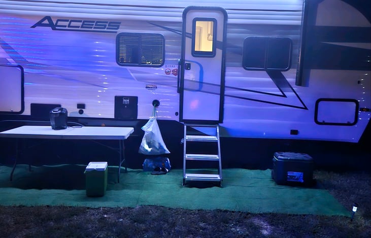 This was on our 2nd use, awning up (some wind gust that night) coming back. The small strip of lights under the awning almost illuminated the awning.