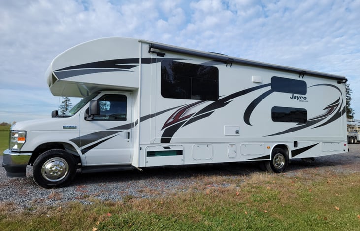 Exterior Driver Side Closed Up - Slide out full length of the RV for extra living space!
