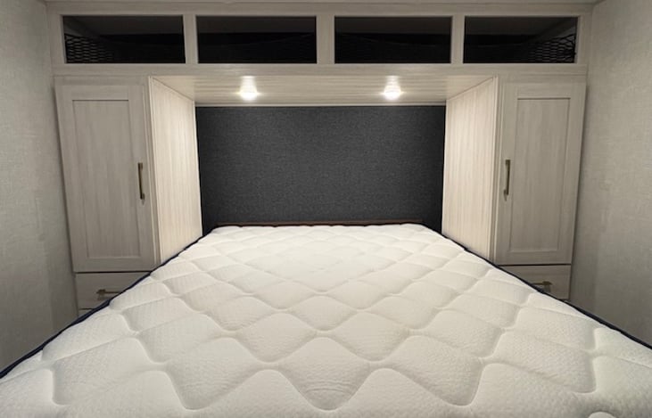 MASTER BEDROOM - will come with clean sheets; storage on each side and above bed