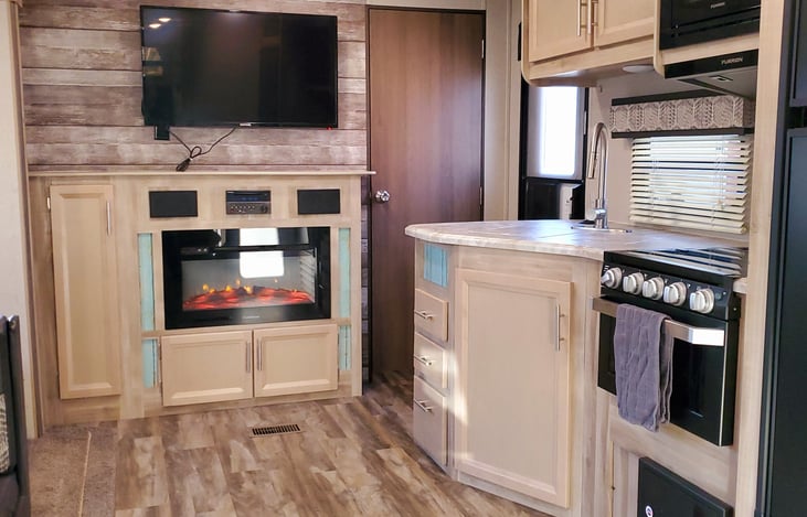 Fully stocked kitchen and electric fireplace