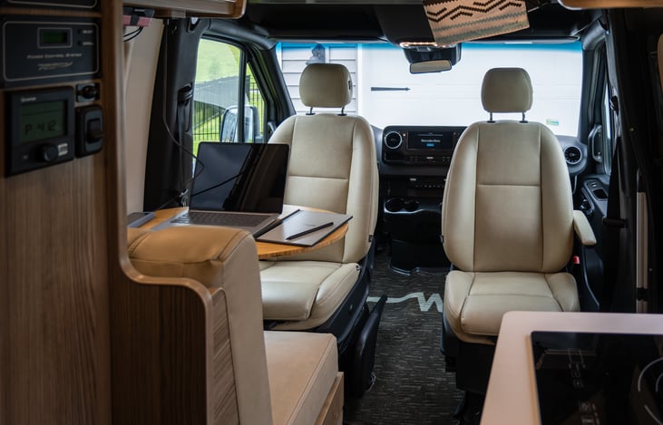 Both driver and passenger chairs swivel to face the living area of the Van.