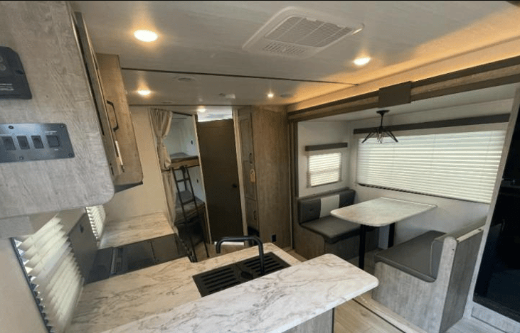 Rear View- Bunks, Bathroom, Pantry, Dinette.